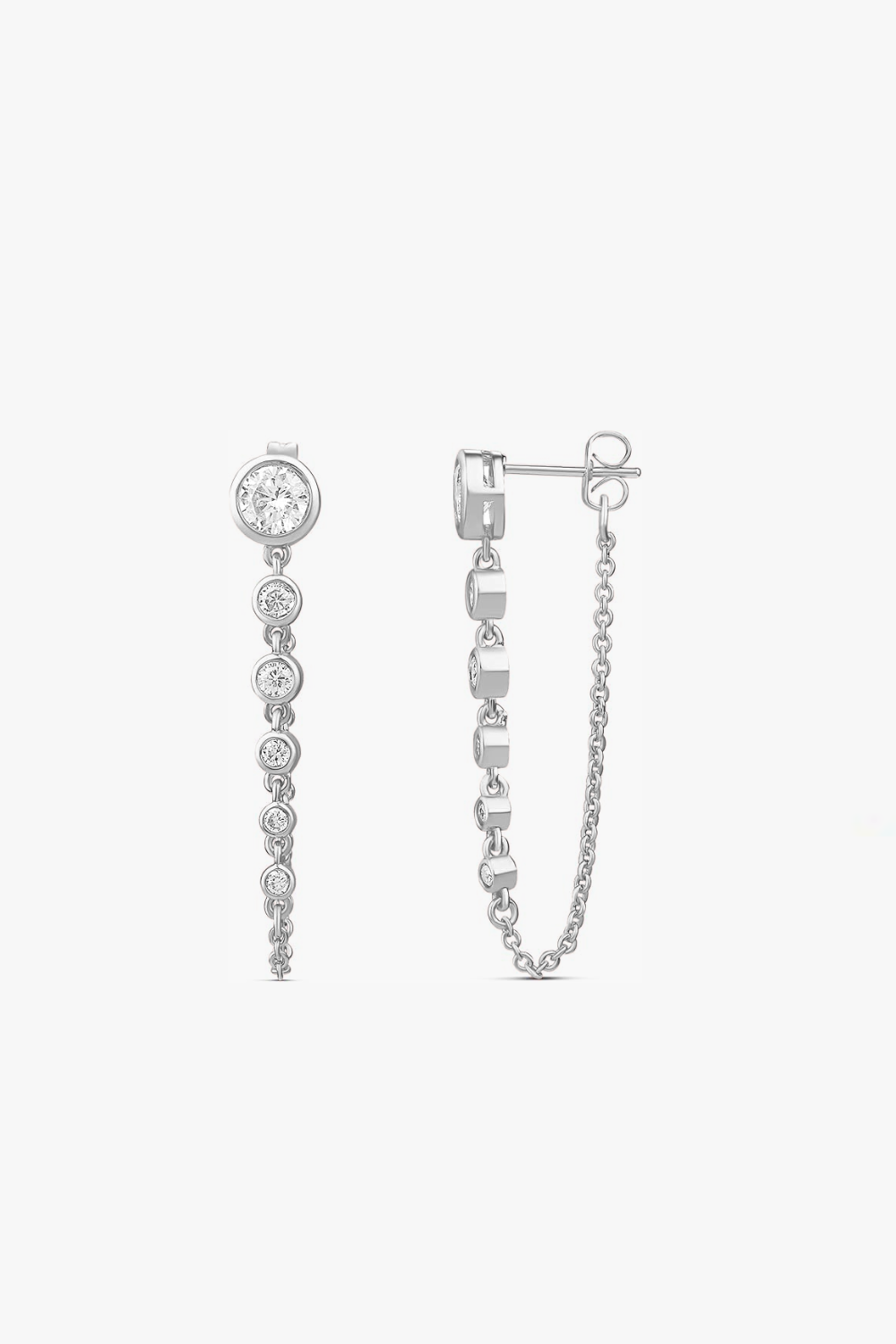 Ari white gold drop earrings with bezel-set stones, chain-back closure, and 1.5-inch length.