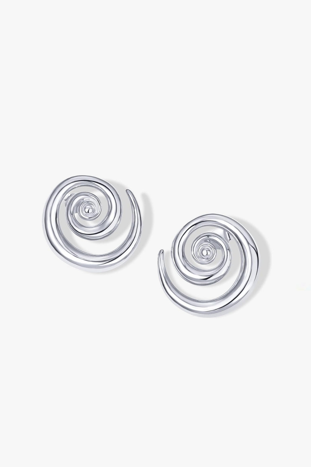 Cleo Earrings – 14k white gold-plated chunky hoop earrings with spiral design, on white background.