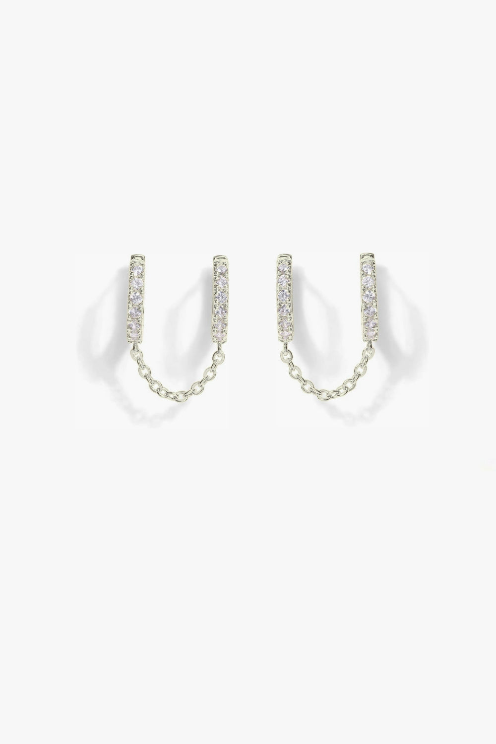 Nellie white gold pavé hoop earrings with slim chain.