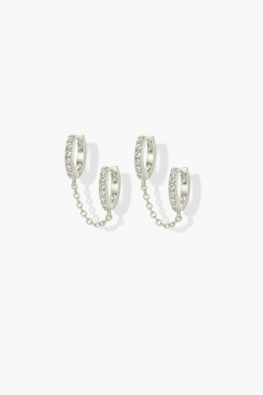 Nellie white gold pavé hoop earrings with slim chain.