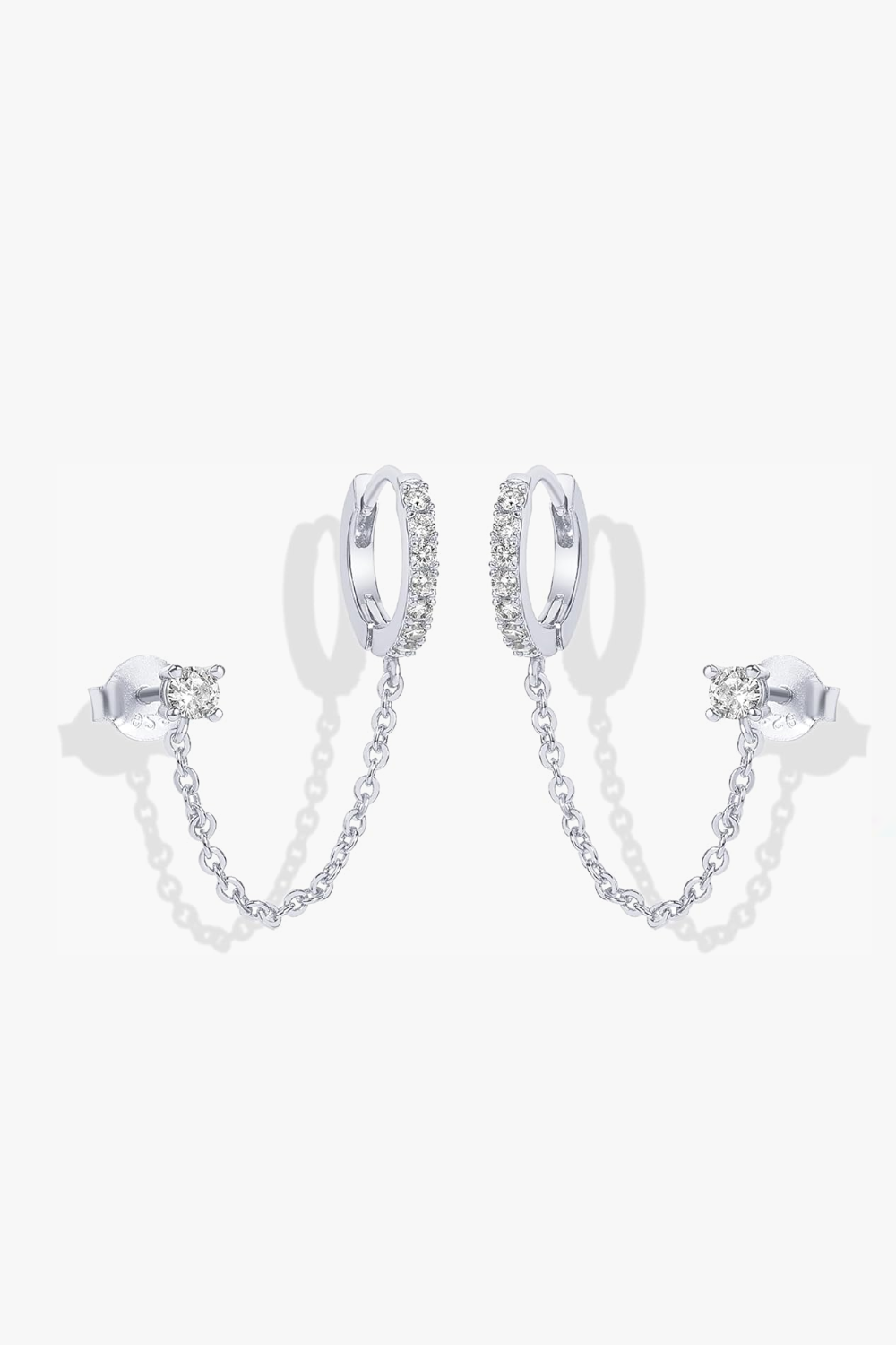 Nicole white gold huggie earrings with stud and chain.