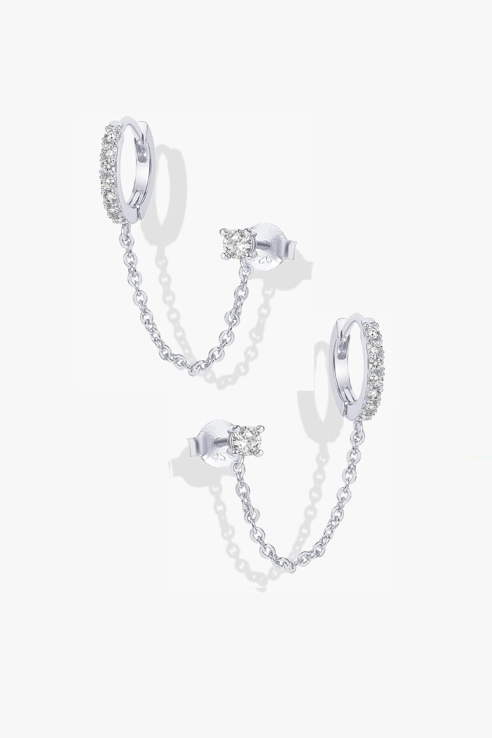 Nicole white gold huggie earrings with stud and chain.