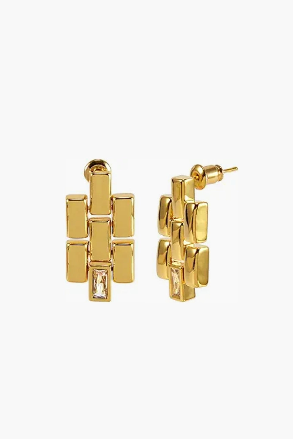 Yellow gold geometric chain link earrings with gem on a white background
