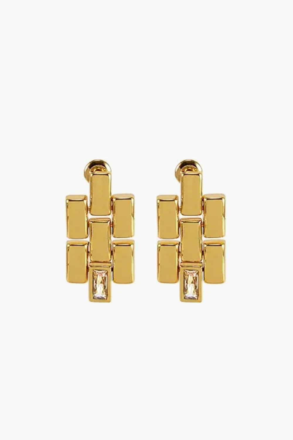 Yellow gold geometric chain link earrings with gem on a white background