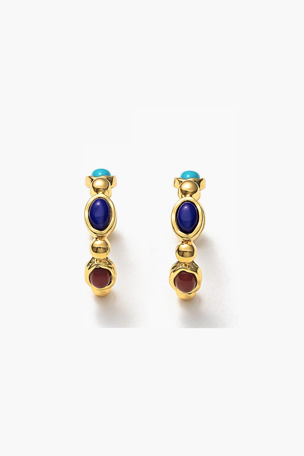 Yellow gold hoop earrings with multicolor colorful gemstones on a white background
