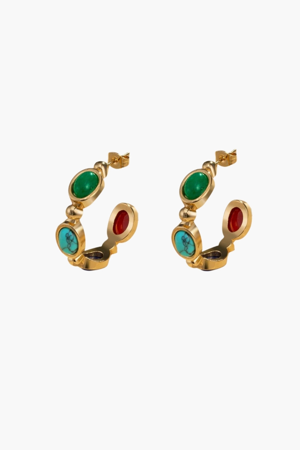Yellow gold hoop earrings with multicolor colorful gemstones on a white background, retro style.
