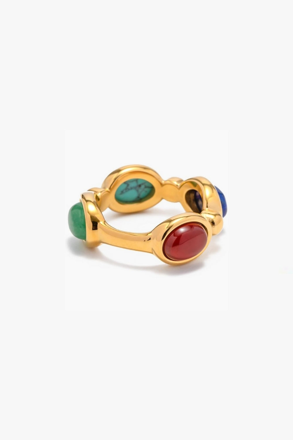 Yellow gold ring with multicolor colorful gemstones on a white background