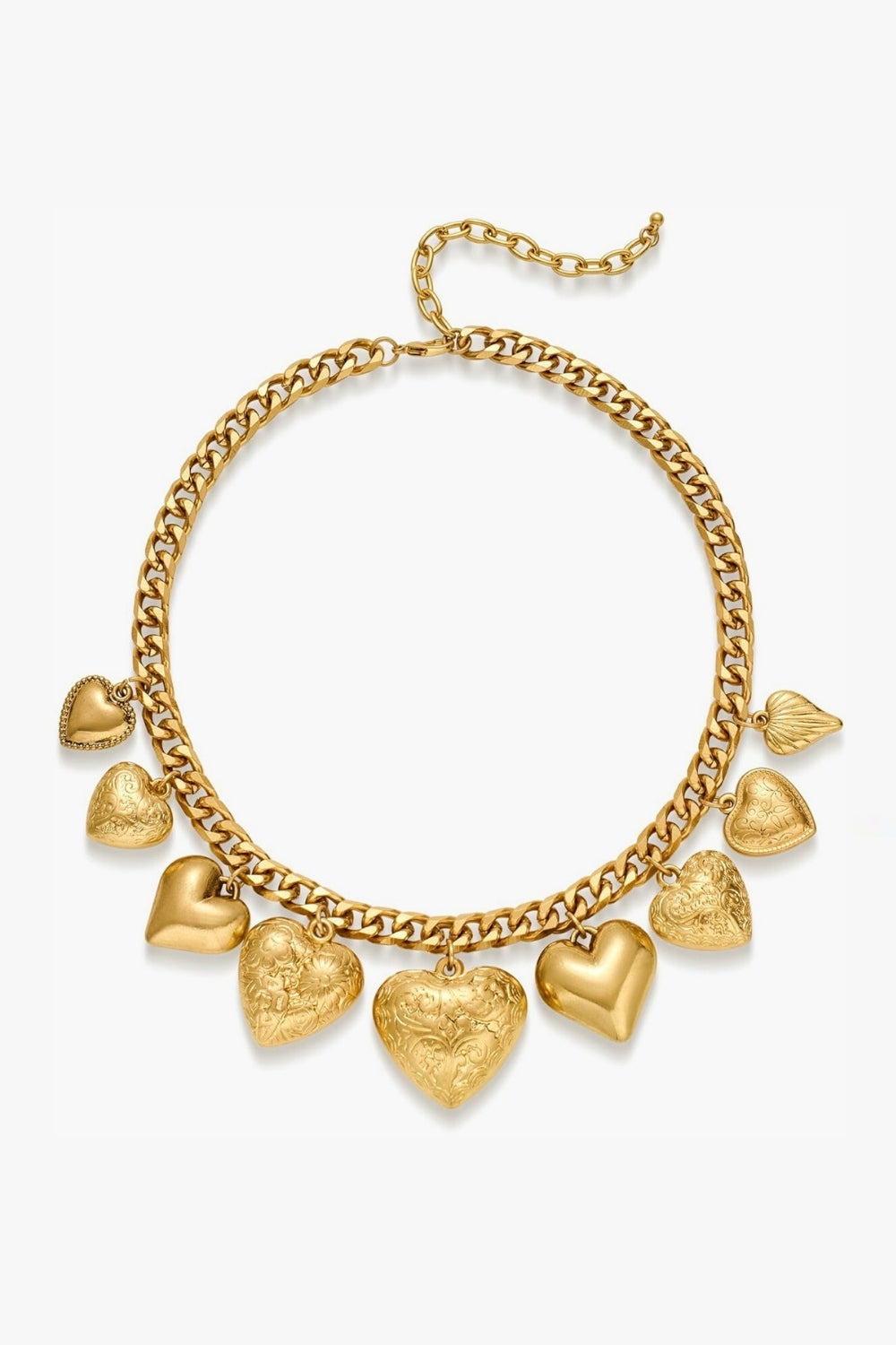 Yellow gold necklace with  chunky vintage heart-shaped charms on a white background