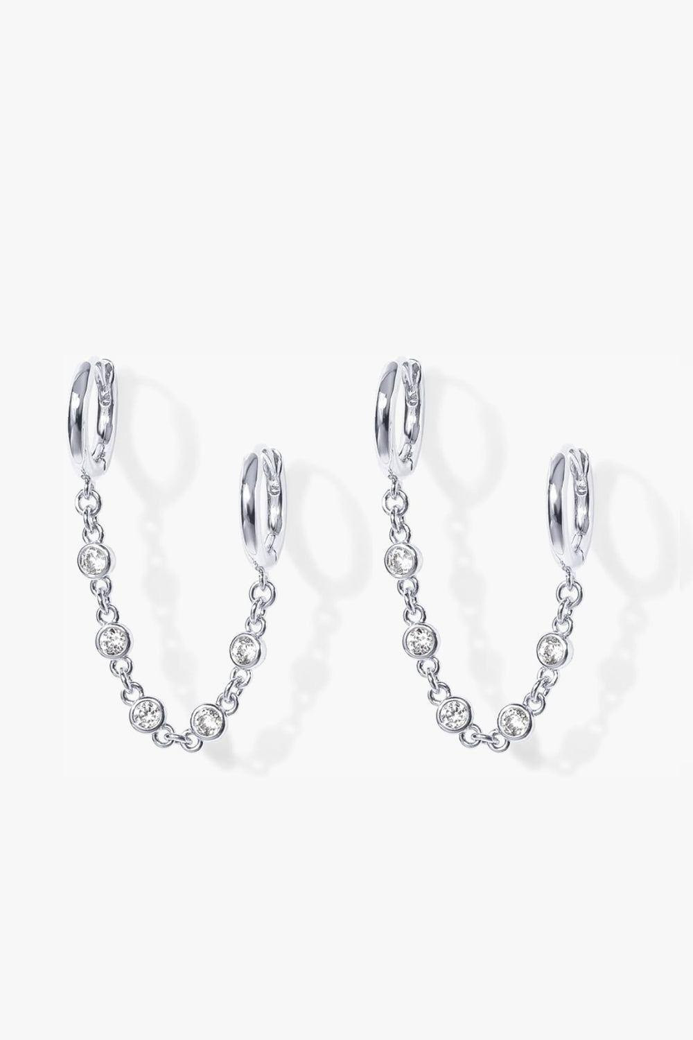 Alexa white gold double huggie earrings with bezel stone chain.