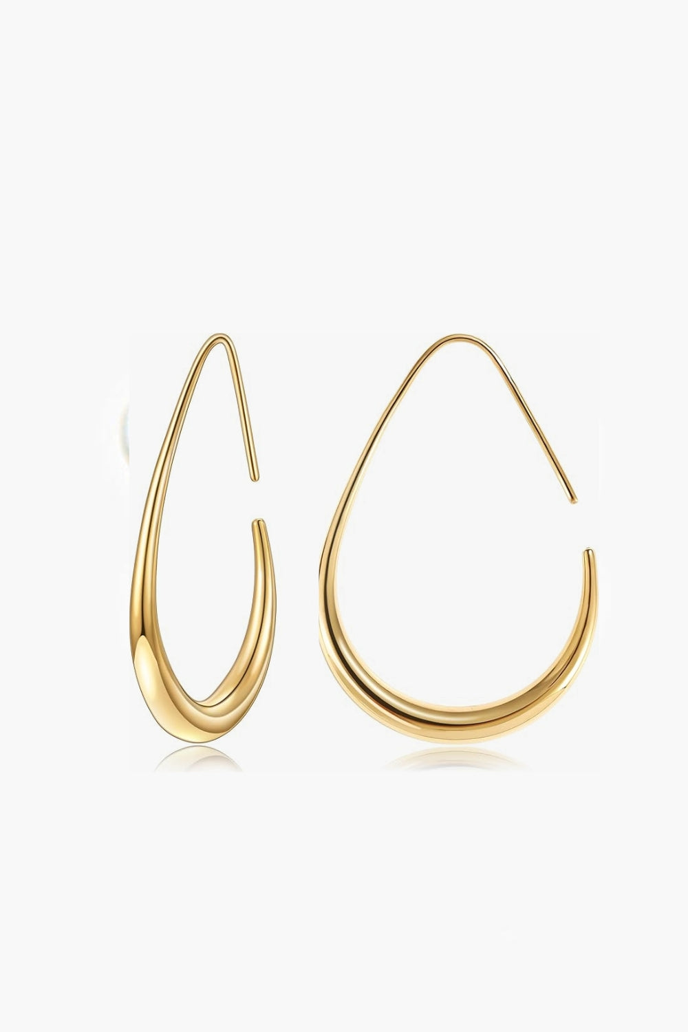 Celia Earring – 14k yellow gold-plated fluid teardrop pull-through earrings with sculptural curves, 40mm drop, on white background.