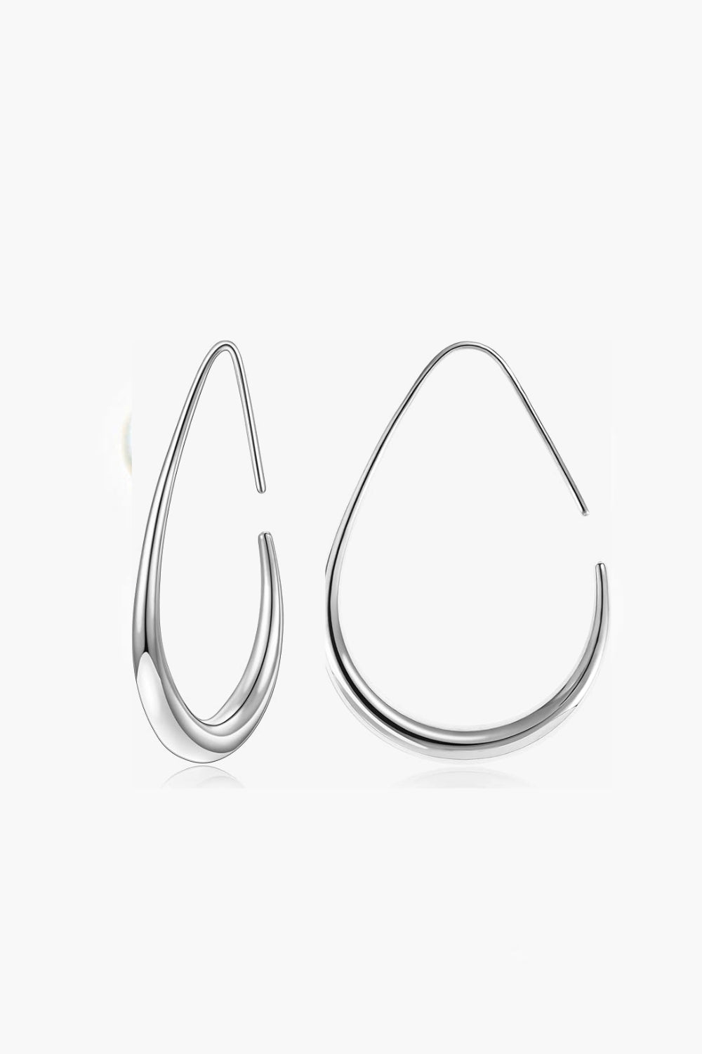 14k white gold-plated fluid teardrop pull-through earrings with sculptural curves, 40mm drop, on white background.