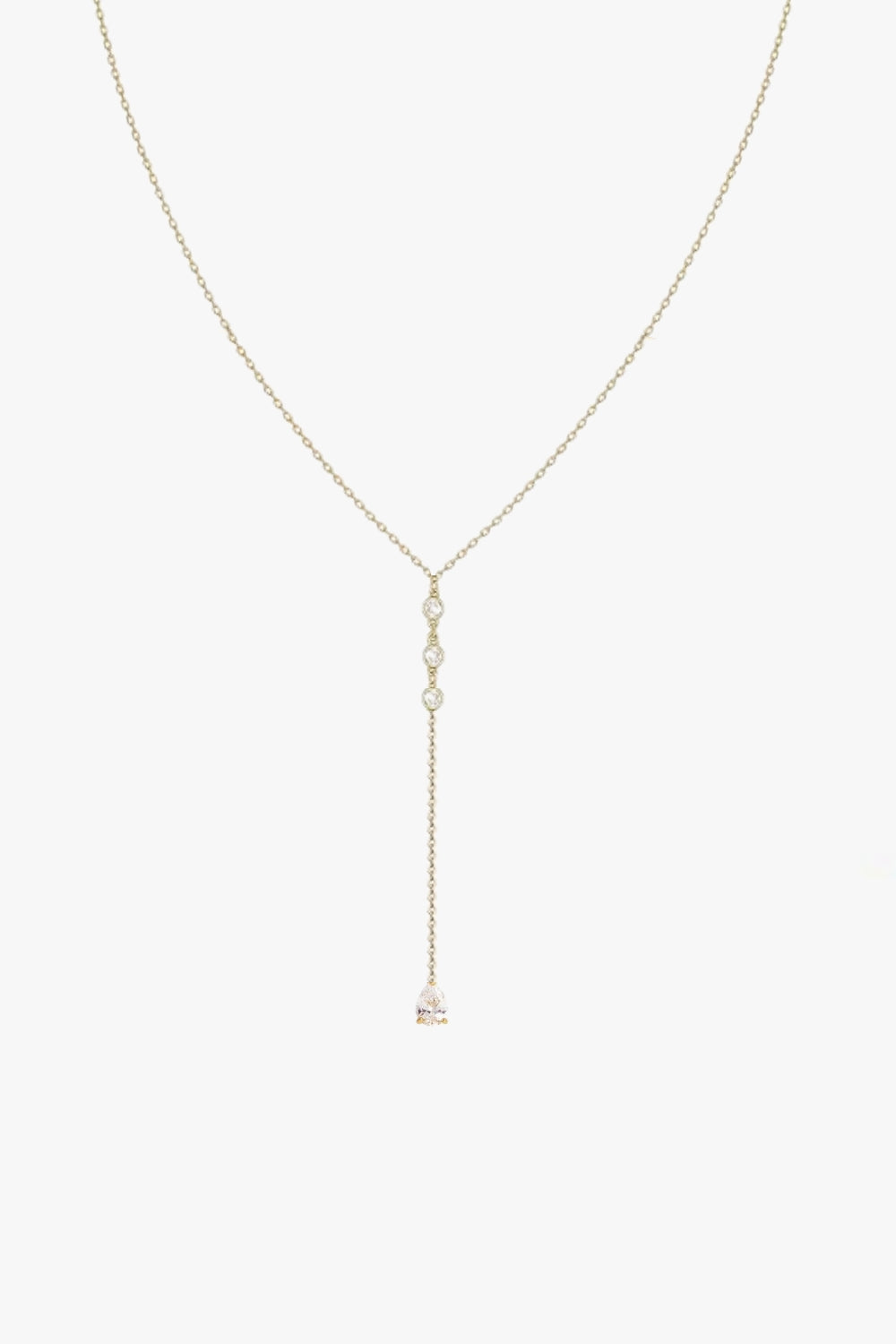 Clara yellow gold necklace with single bezel set stone pendant. Y-style lariat.