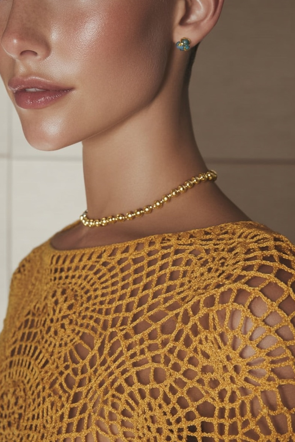 Model wearing the Isla Necklace – delicate 14k yellow gold-plated beaded chain necklace.