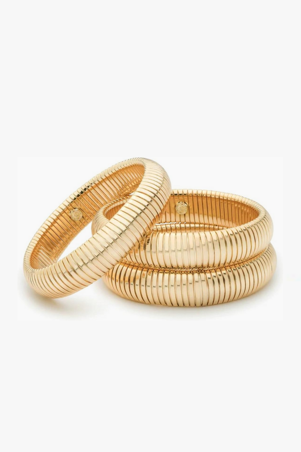 Juliette Classic Bracelet in yellow gold stretch bangle with ridged texture, 12mm wide slip-on design on white background