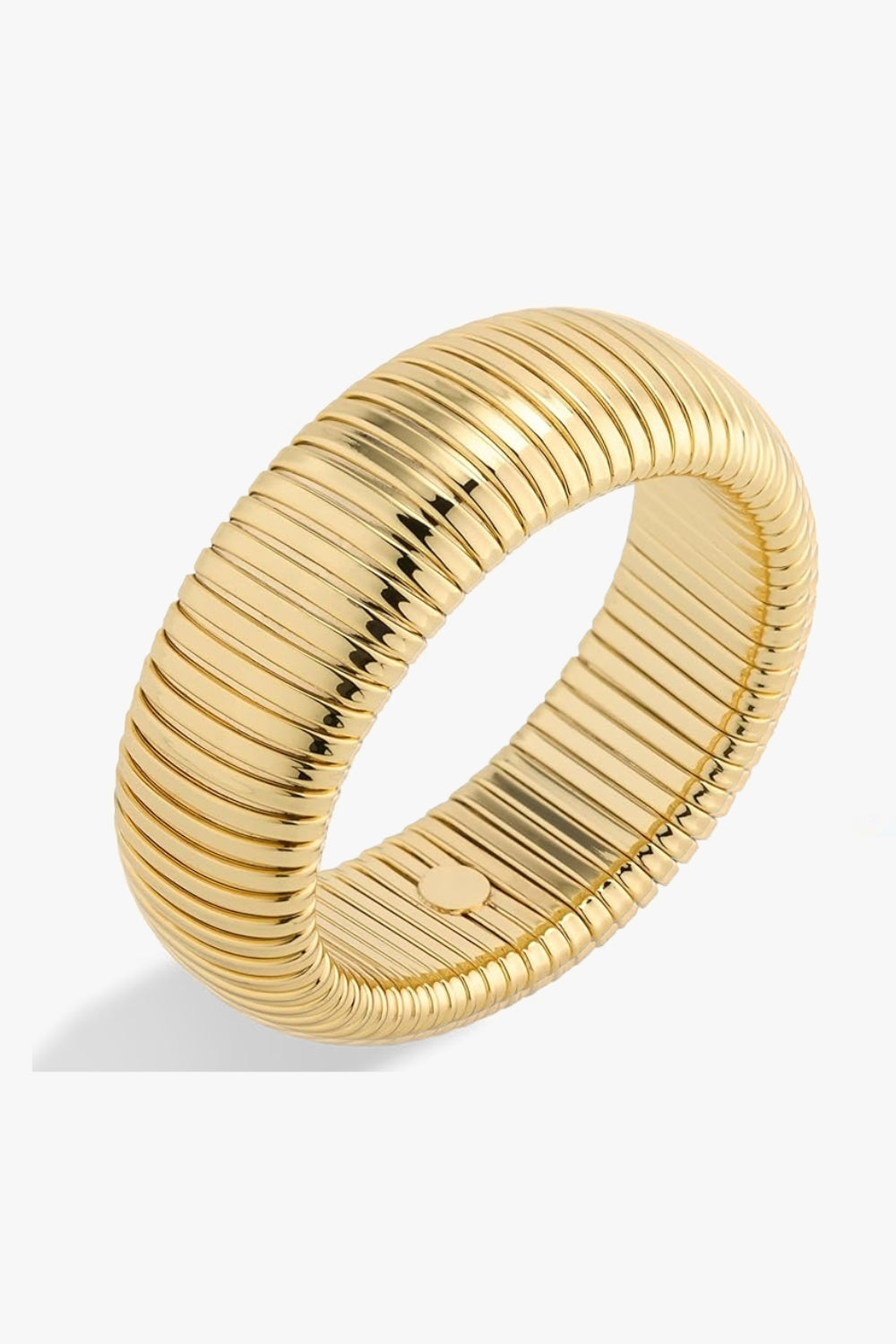 Yellow gold bracelet 20 mm wide with ribbed texture on a white background