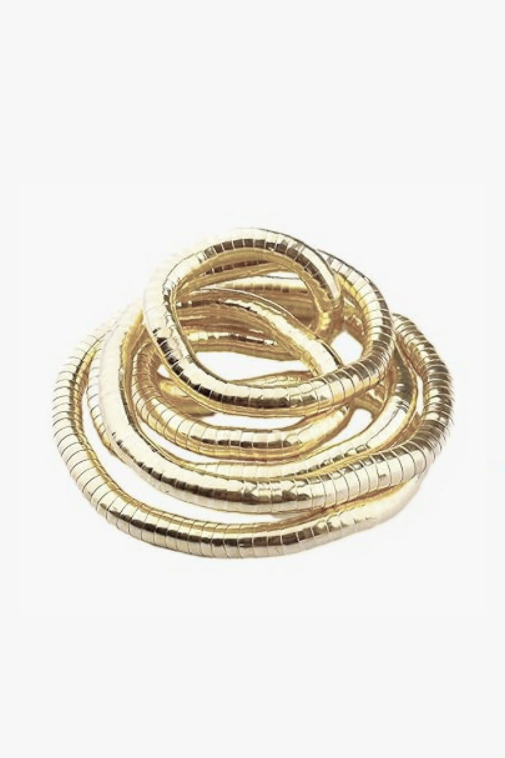 Yellow gold adjustable spiral bracelet and necklace on white background.