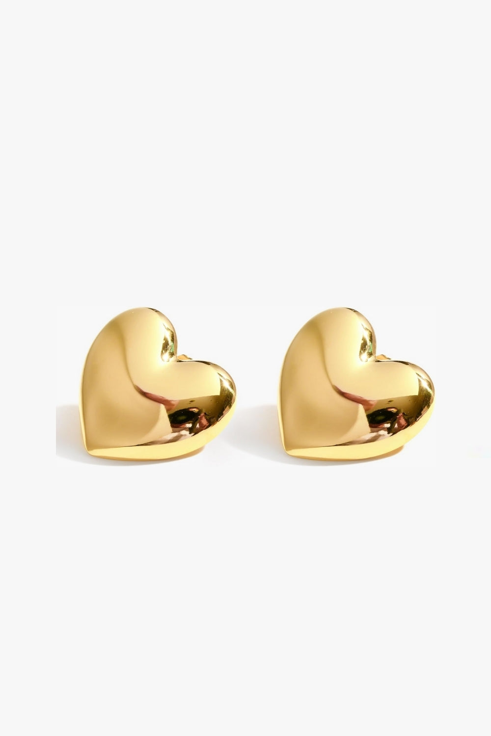 Yellow gold puffed heart-shaped stud earrings on a white background.