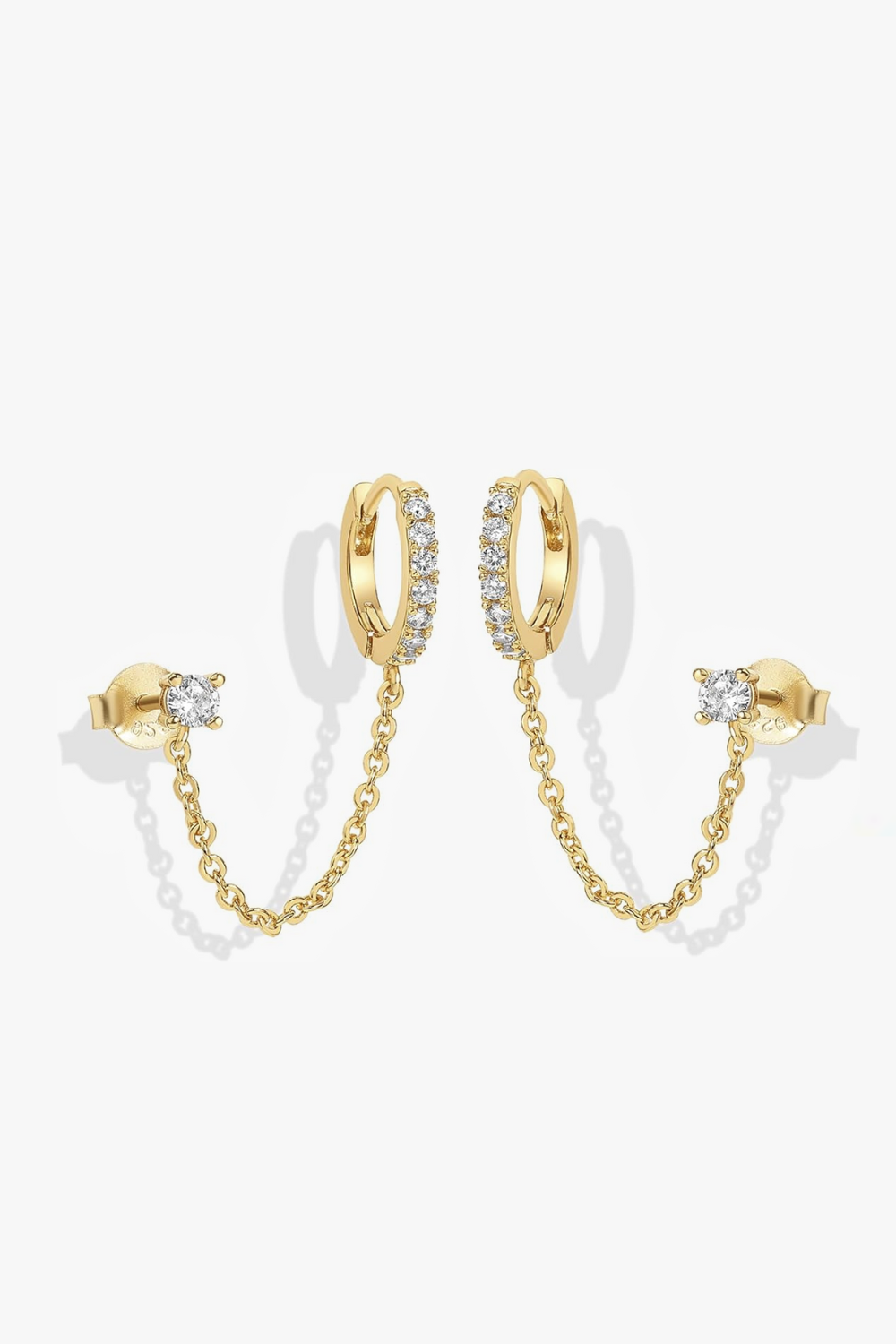 Nicole yellow gold huggie earrings with stud and chain.