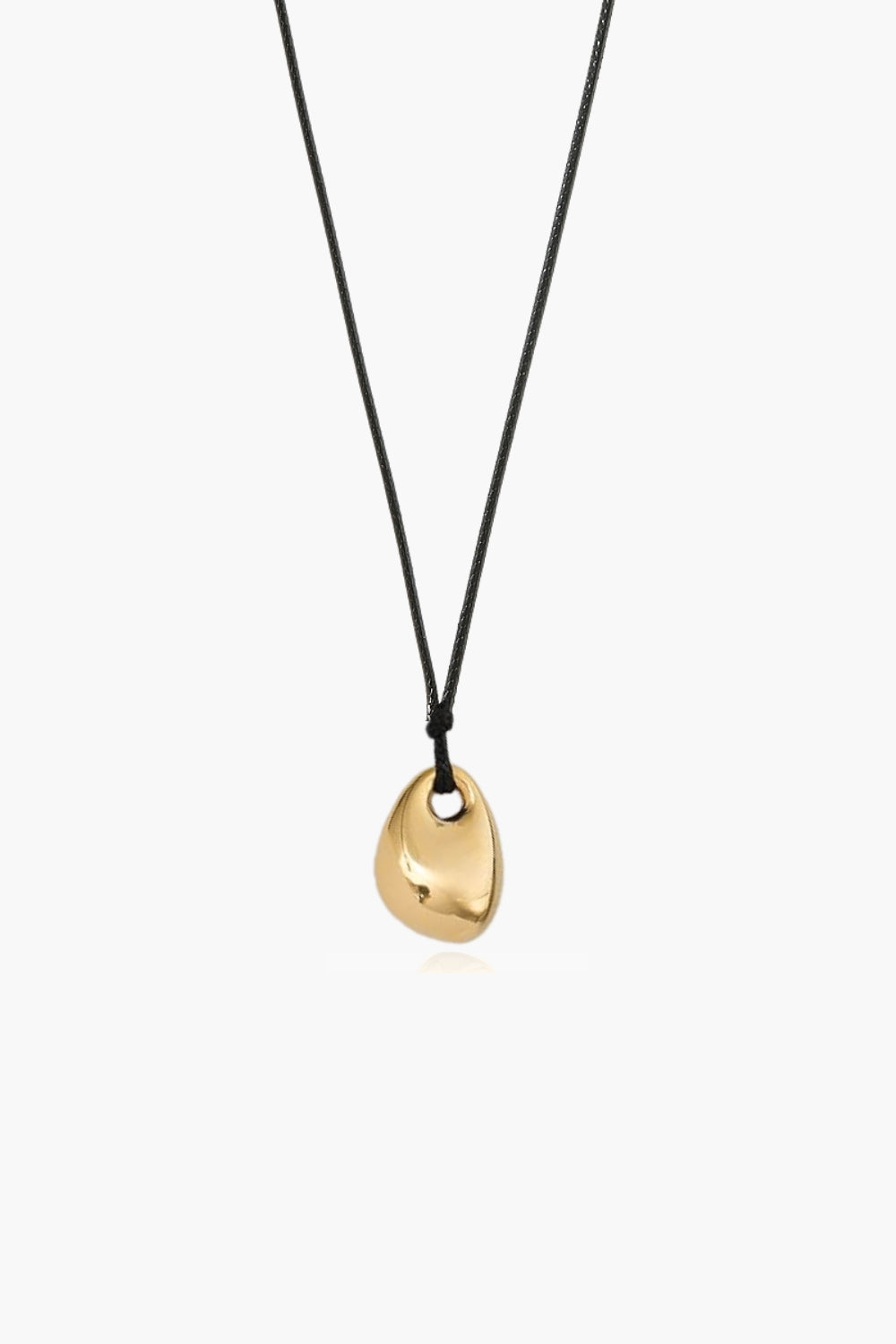 abstract shape yellow gold pendant necklace with black cord on a white background
