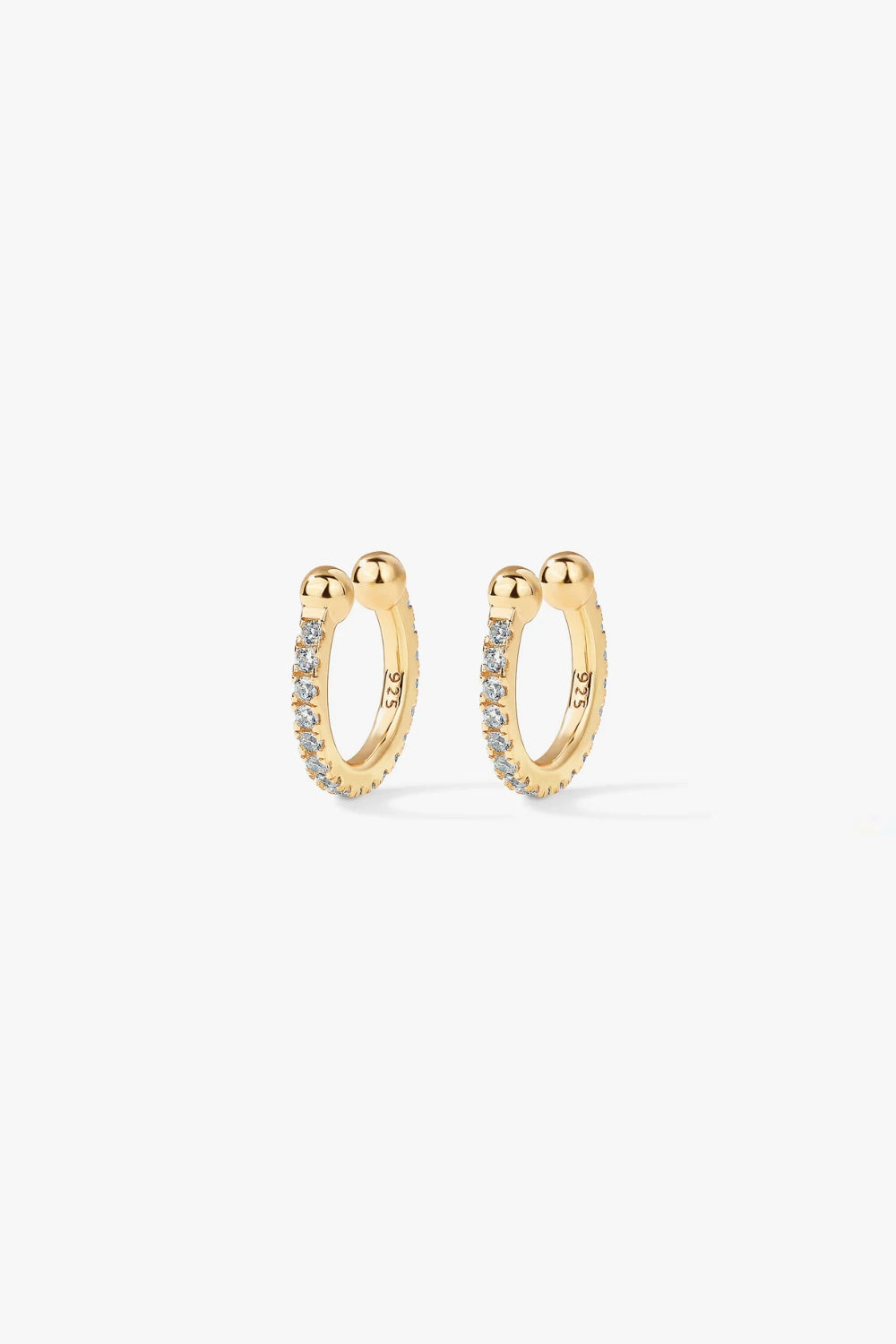 Paige yellow gold adjustable hoop pavé ear cuff with slender curved design.