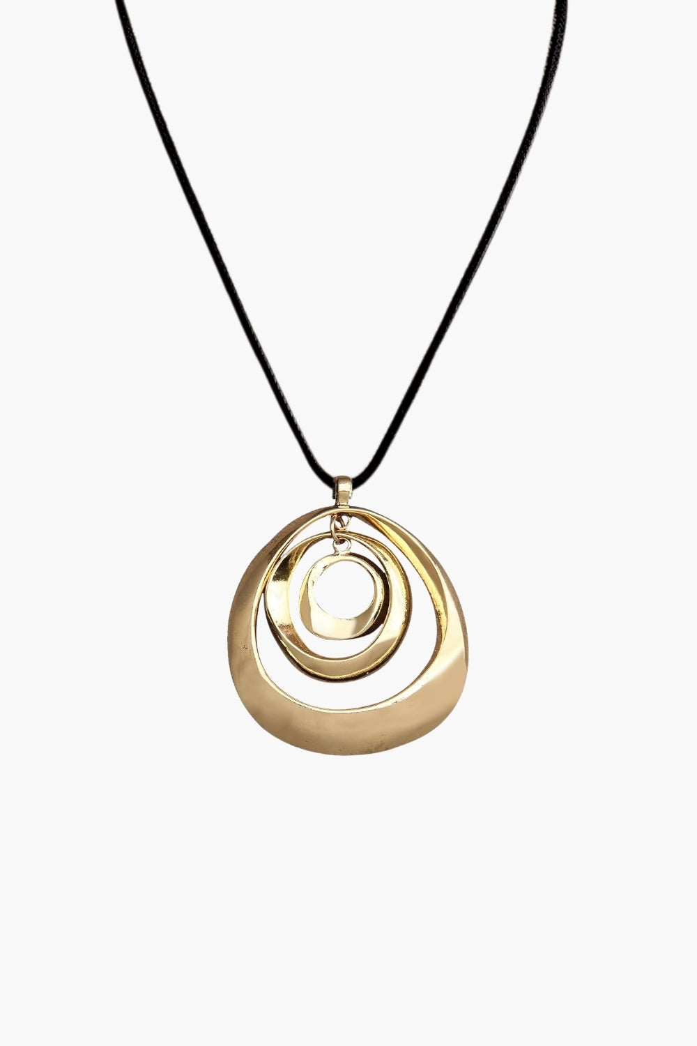 yellow gold necklace with big 3-layer pendant and black cord on a white background