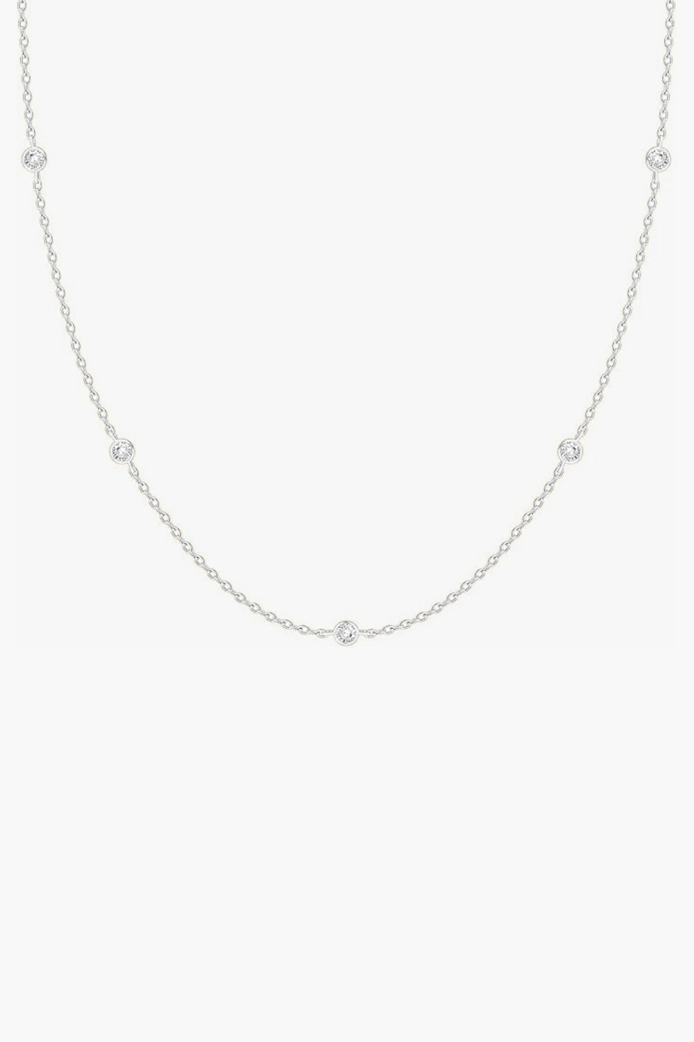 Tali white gold station necklace with five bezel-set stones.